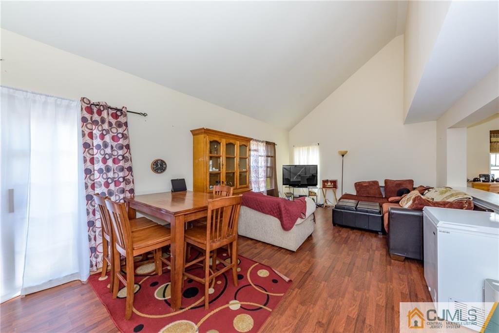6 Yorkshire Village Road Lawrence Township, NJ 08648 - Photo 11 of 30 a living room with furniture and wooden floor