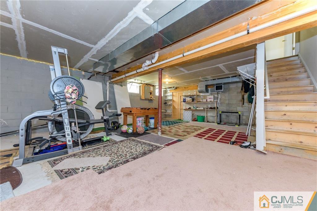 6 Yorkshire Village Road Lawrence Township, NJ 08648 - Photo 25 of 30 a view of a room with gym equipment