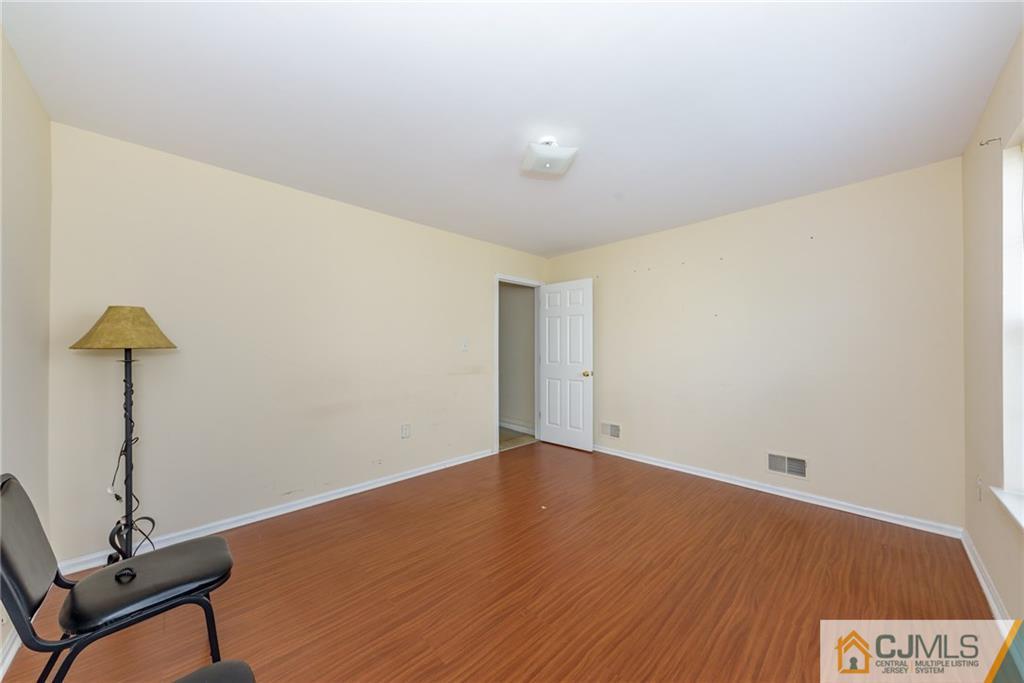 6 Yorkshire Village Road Lawrence Township, NJ 08648 - Photo 6 of 30 a view of an empty room