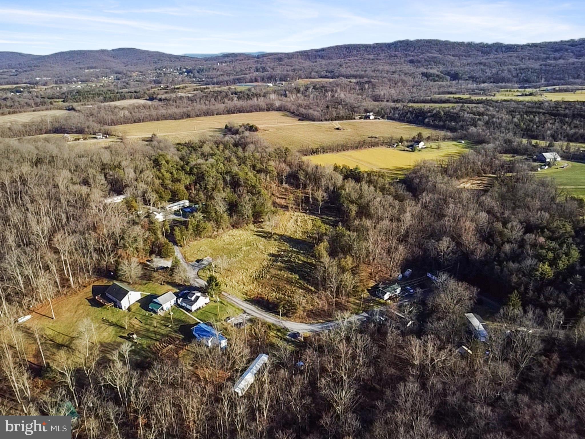 245 Bumble Bee Hollow Road Wellsville, PA 17365 - Photo 17 of 25 a view of lake and mountain