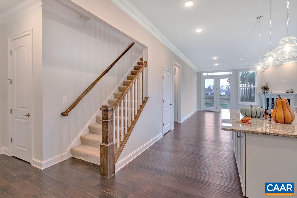 352 Claibourne Road Crozet, VA 22932 - Photo 17 of 28 a view of entryway and kitchen with wooden floor