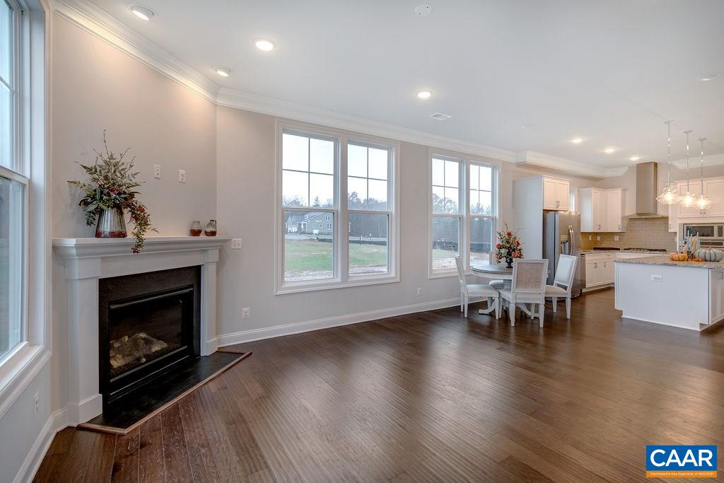 352 Claibourne Road Crozet, VA 22932 - Photo 22 of 28 a living room with furniture and a fireplace