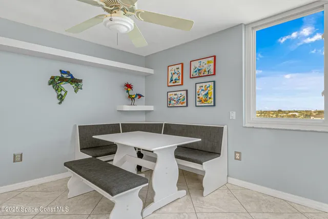 a view of kitchen with furniture and window