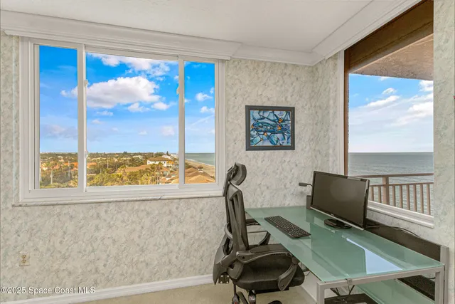 a black and white photo of a living room