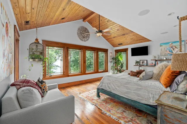 a spacious bathroom with a tub and sink