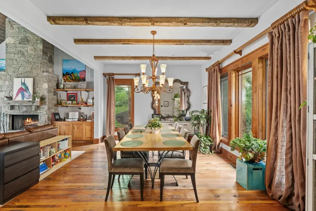 a room with furniture and flat screen tv