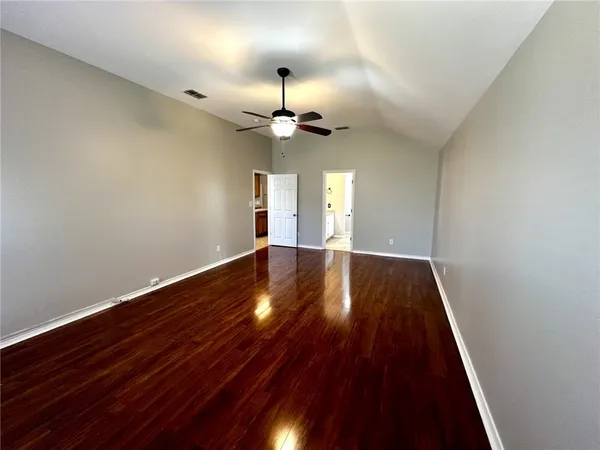 a view of entryway with wooden floor