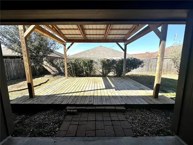 a view of a backyard of a house