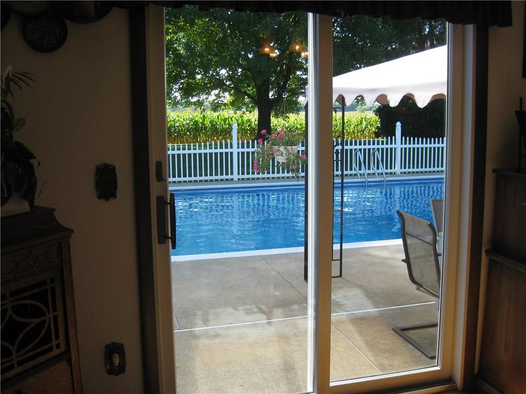 1475 Plain Grove Road Volant, PA 16156 - Photo 12 of 25 Walk out of the dining room into the pool area....breathtaking!