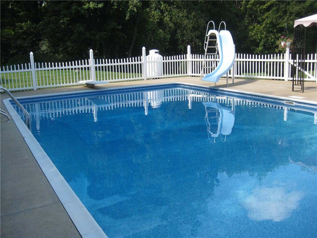 1475 Plain Grove Road Volant, PA 16156 - Photo 13 of 25 Pool season isn't over yet....this one is heated!!!!!!