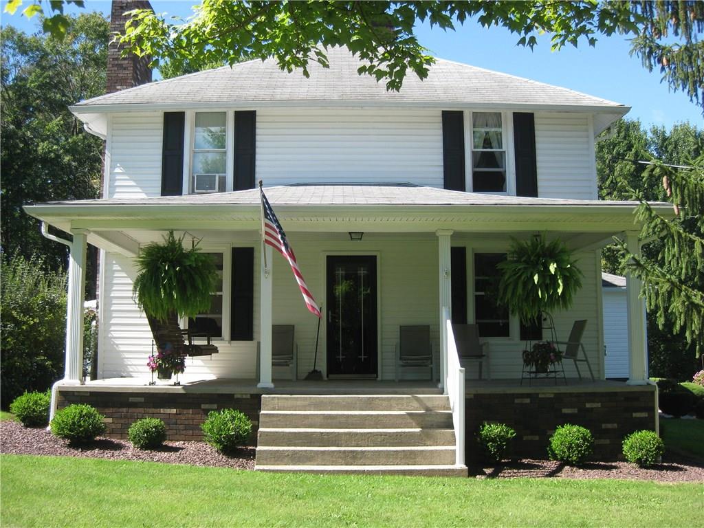 1475 Plain Grove Road Volant, PA 16156 - Photo 3 of 25 1475 Plain Grove Road invites you to visit and relax on the front porch!