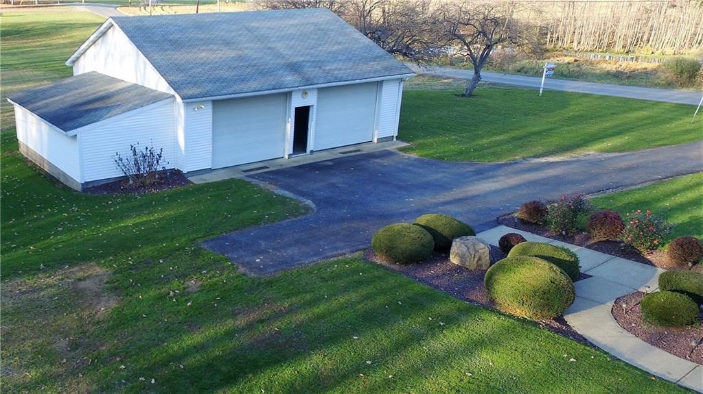 1475 Plain Grove Road Volant, PA 16156 - Photo 25 of 25 Garage EXTRA LARGE! Two doors but can hold four vehicles and then some!