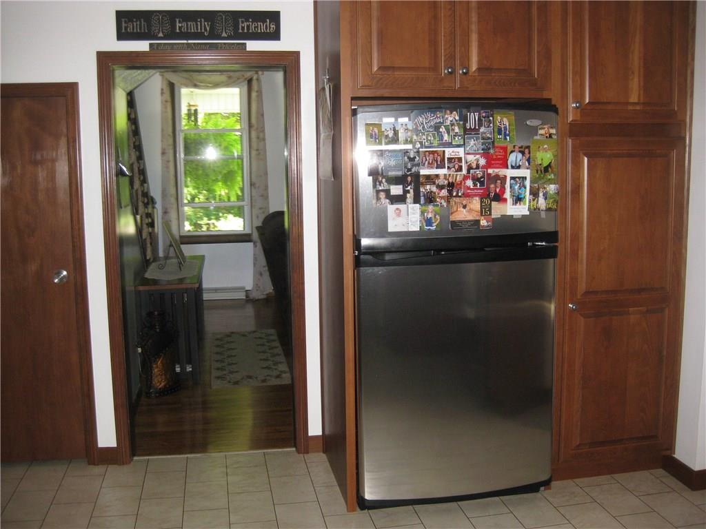 1475 Plain Grove Road Volant, PA 16156 - Photo 7 of 25 Hallway leading to the living room, front door and the upstairs!