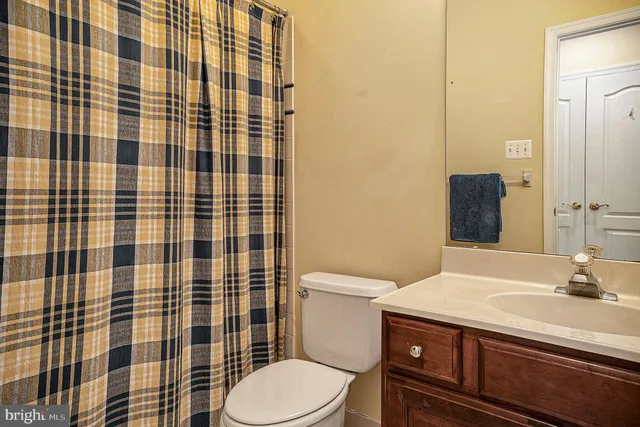a view of house with furniture and table and chairs