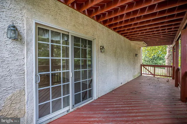 front view of a house with a tree