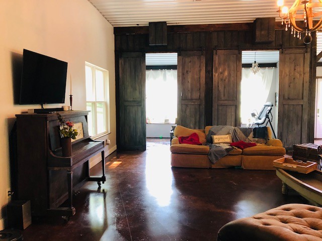 248 Access Road Pulaski, TN 38478 - Photo 13 of 19 a living room with furniture and a flat screen tv