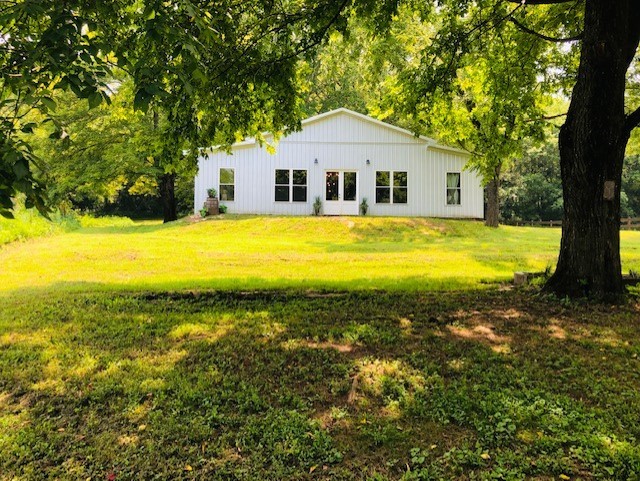 248 Access Road Pulaski, TN 38478 - Photo 4 of 19 a view of a house with a yard