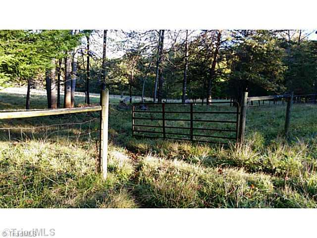 9075 Broad Street Rural Hall, NC 27045 - Photo 13 of 23 Entry. Entry to one of the many fields