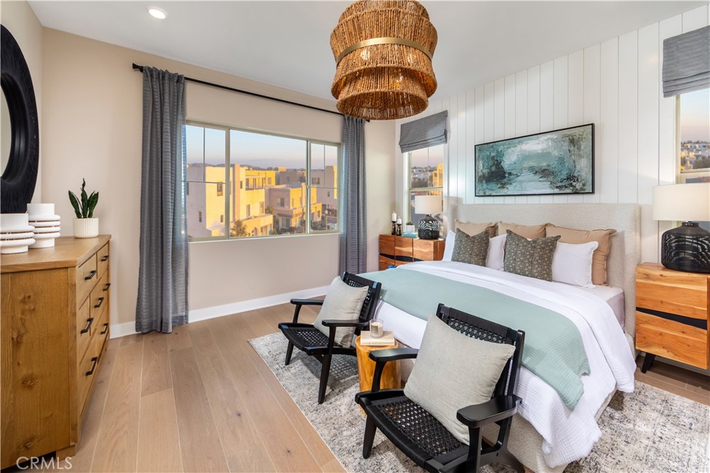 182 Carmine Irvine, CA 92618 - Photo 6 of 15 a bedroom with a bed and wooden floor