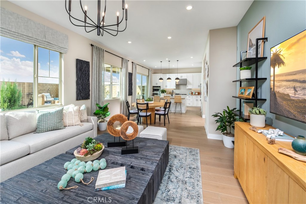 182 Carmine Irvine, CA 92618 - Photo 8 of 15 a living room with furniture wooden floor and a large window
