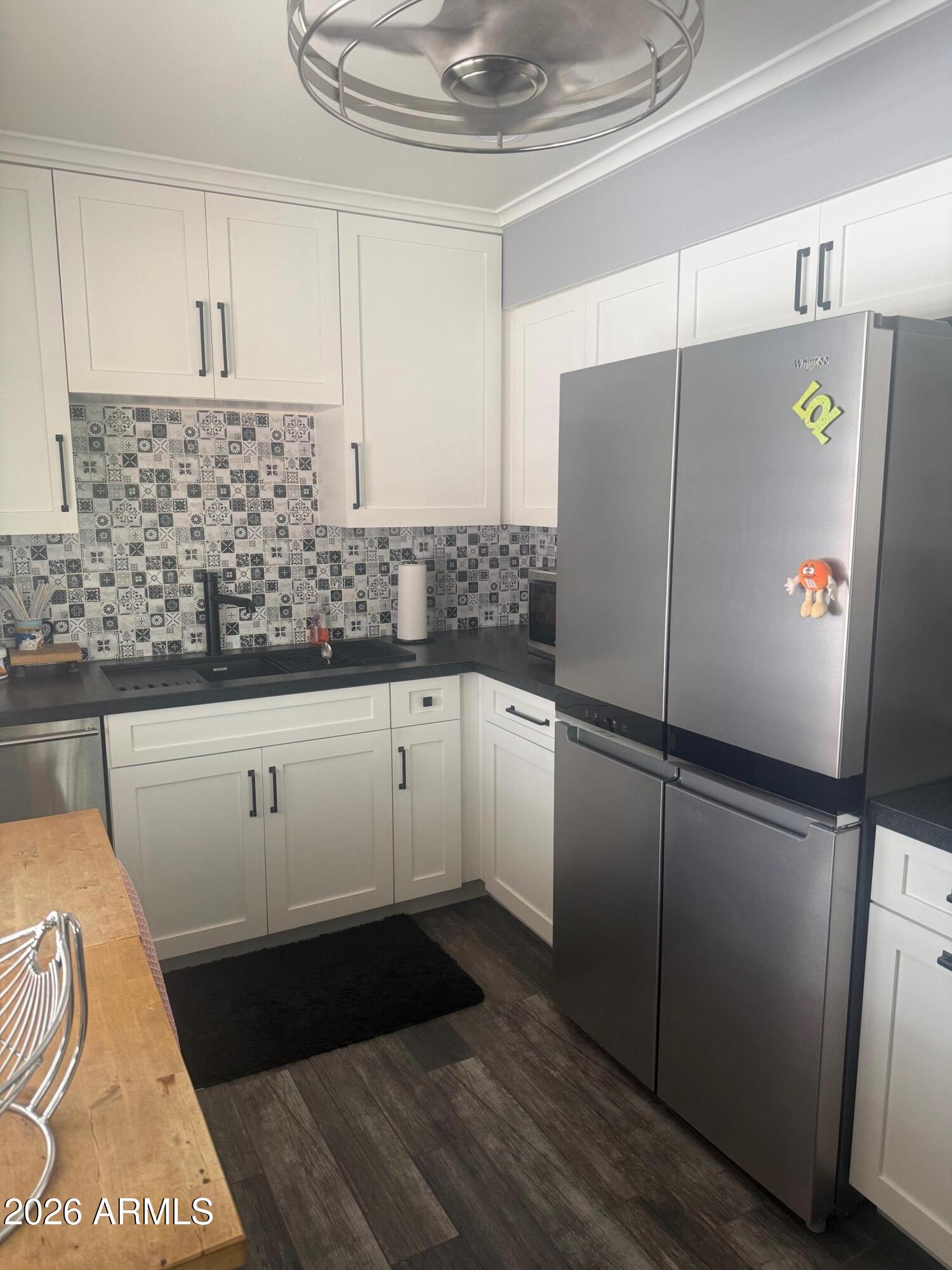 126 East Coronado Road, Unit 17 Phoenix, AZ 85004 - Photo 11 of 30 a kitchen with a refrigerator and a sink