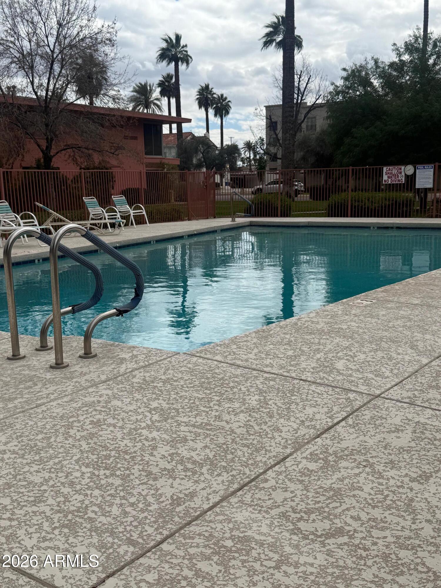 126 East Coronado Road, Unit 17 Phoenix, AZ 85004 - Photo 27 of 30 a view of a lake with a house