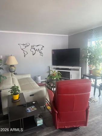 a room with furniture and a large window