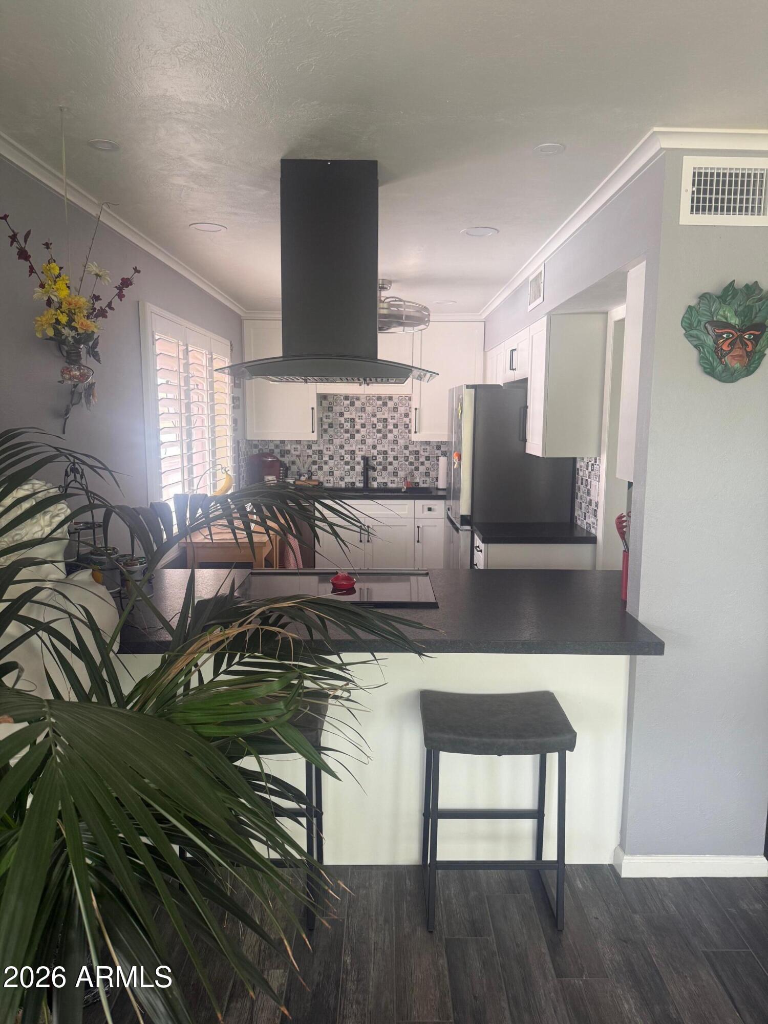 126 East Coronado Road, Unit 17 Phoenix, AZ 85004 - Photo 9 of 30 a living room with furniture and wooden floor
