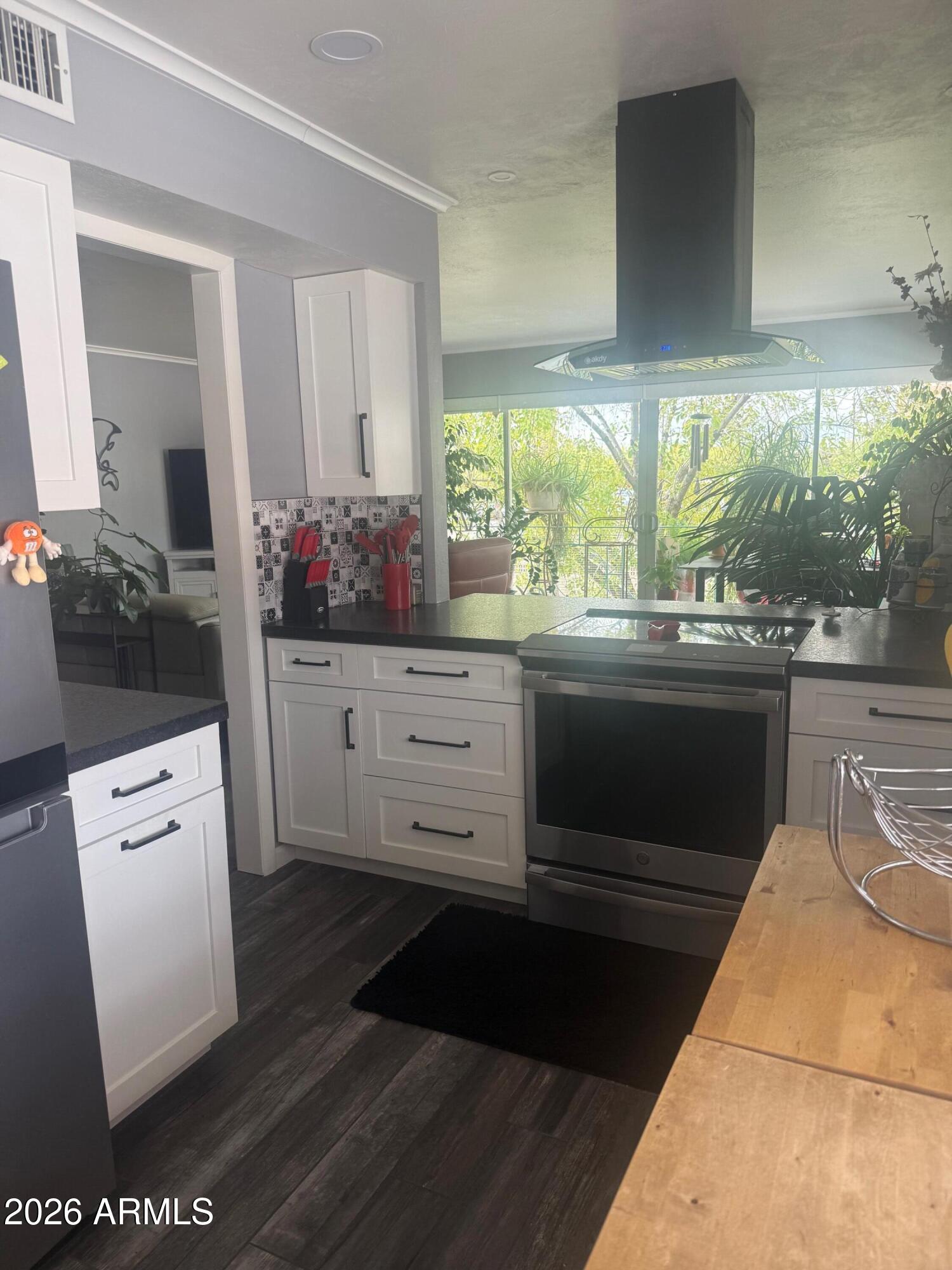 126 East Coronado Road, Unit 17 Phoenix, AZ 85004 - Photo 10 of 30 a kitchen with stainless steel appliances a stove a sink and a refrigerator