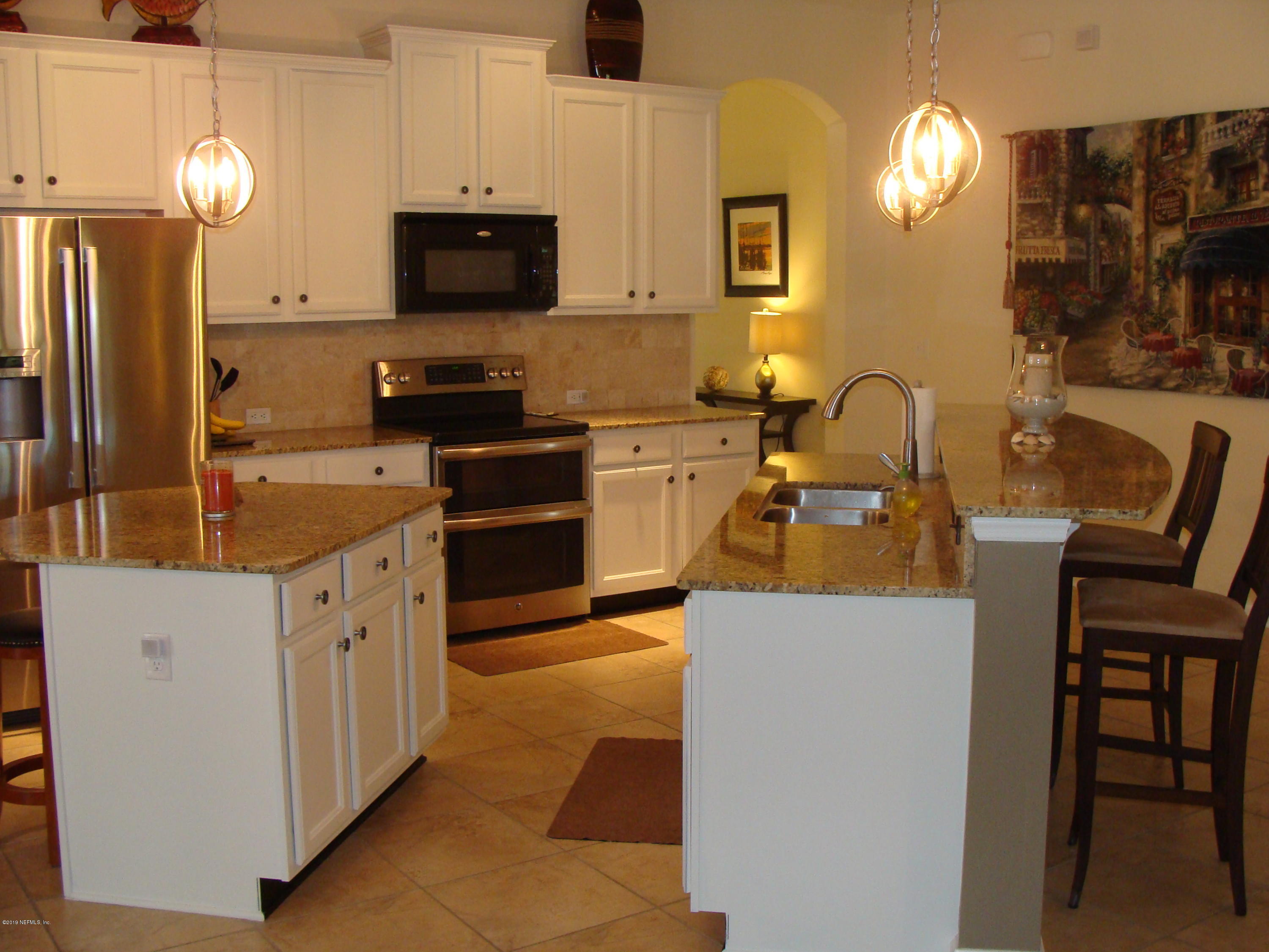 660 Porta Rosa Circle St. Augustine, FL 32092 - Photo 5 of 28 Kitchen with Breakfast Bar