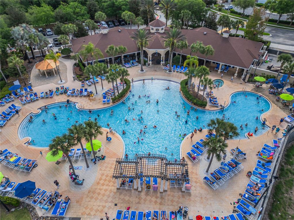 2817 Almaton Loop, Unit 301 Kissimmee, FL 34747 - Photo 3 of 51 an aerial view of a swimming pool with outdoor seating