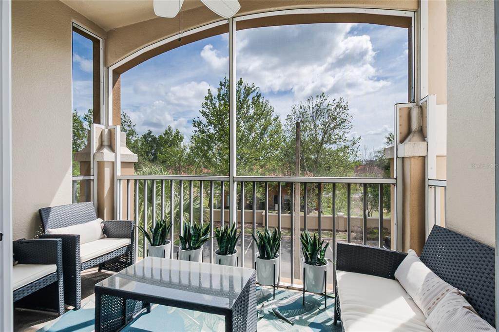 2817 Almaton Loop, Unit 301 Kissimmee, FL 34747 - Photo 31 of 51 a view of a balcony with furniture