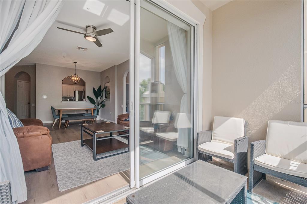 2817 Almaton Loop, Unit 301 Kissimmee, FL 34747 - Photo 33 of 51 a living room with furniture