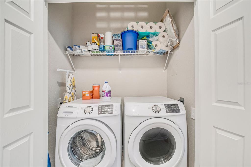 2817 Almaton Loop, Unit 301 Kissimmee, FL 34747 - Photo 35 of 51 a view of washer and dryer in a utility room