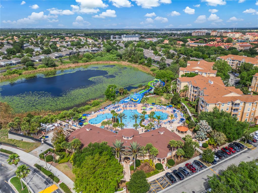 2817 Almaton Loop, Unit 301 Kissimmee, FL 34747 - Photo 40 of 51 an aerial view of residential houses with outdoor space