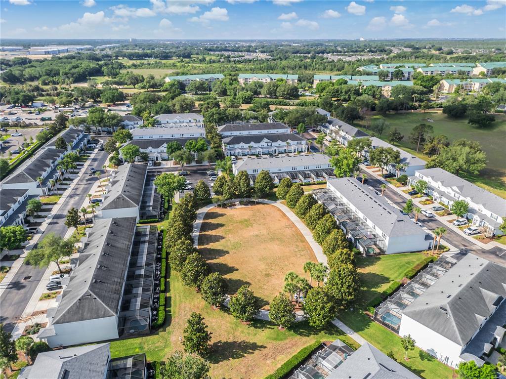 2817 Almaton Loop, Unit 301 Kissimmee, FL 34747 - Photo 50 of 51 an aerial view of residential houses with outdoor space