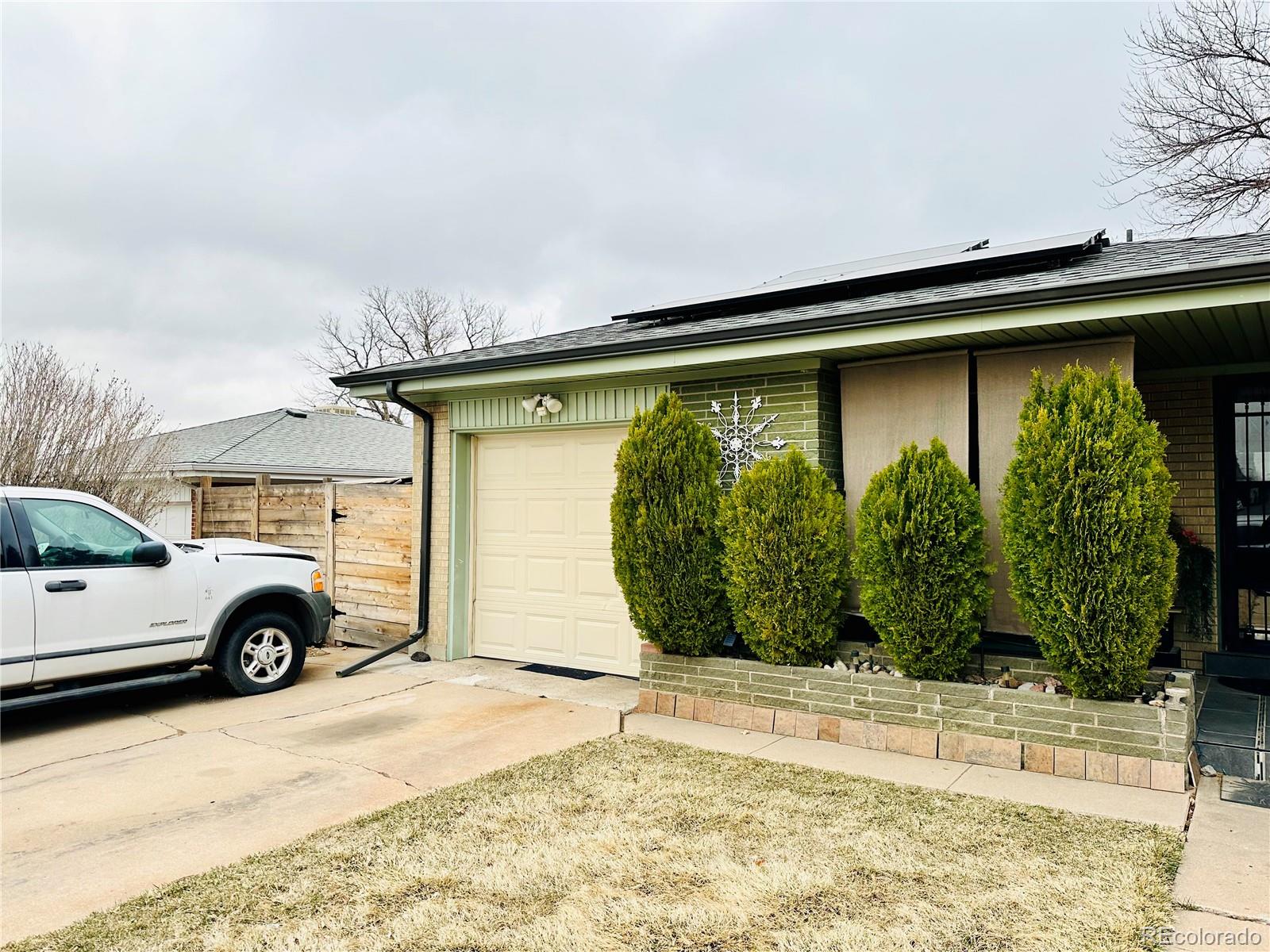 662 South Tejon Street Denver, CO 80223 - Photo 3 of 19 a view of a car in front of a house