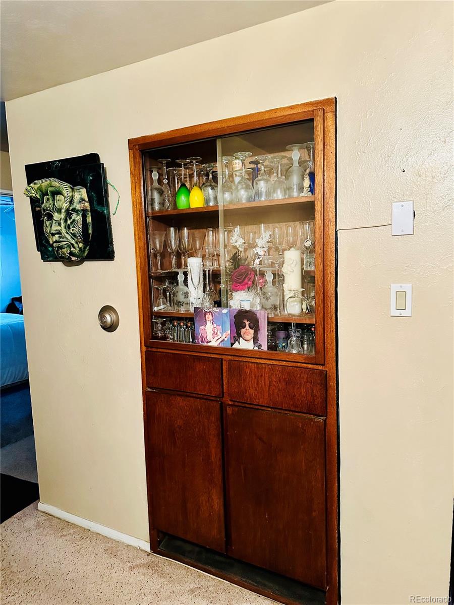 662 South Tejon Street Denver, CO 80223 - Photo 8 of 19 a room with wooden floor and large window