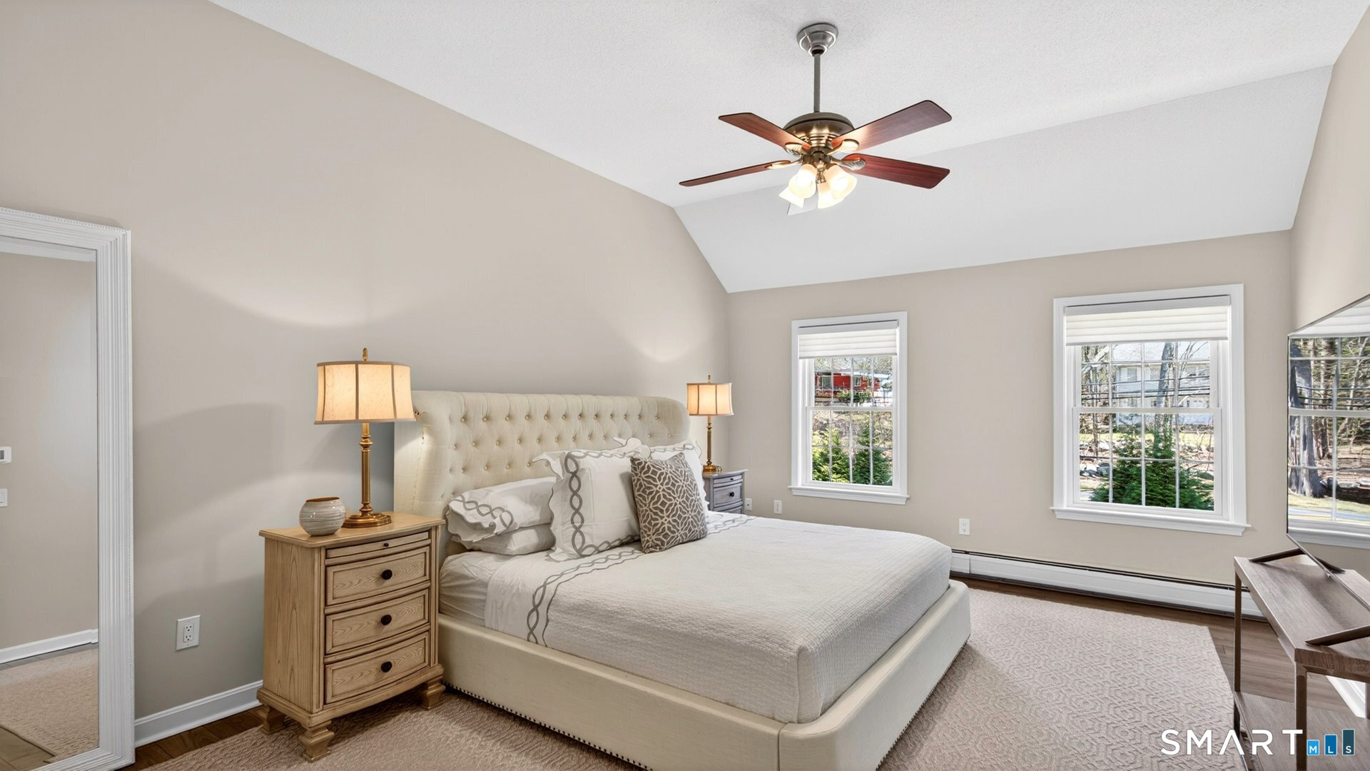 389 Huckleberry Hill Road Avon, CT 06001 - Photo 19 of 35 Primary bedroom with vaulted ceiling, newer flooring and fresh paint.