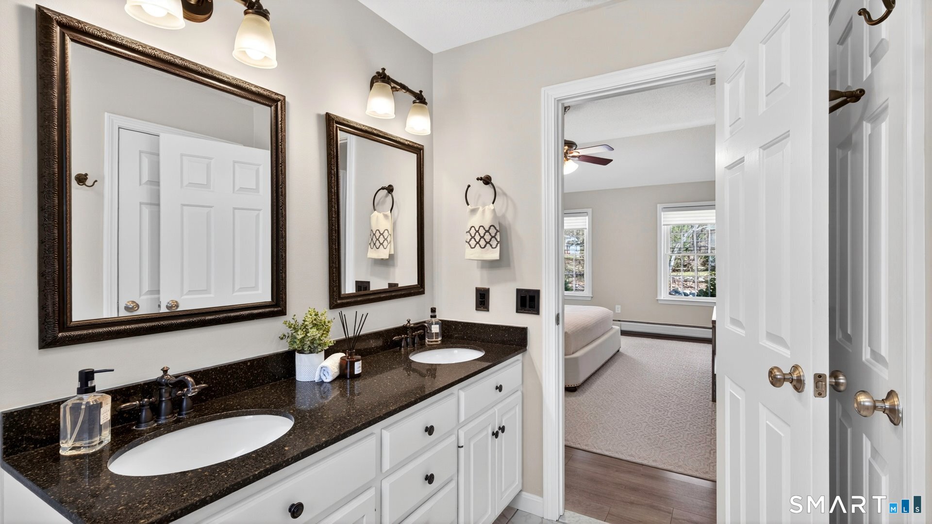 389 Huckleberry Hill Road Avon, CT 06001 - Photo 21 of 35 Ensuite full bath with double sinks, and linen closet.
