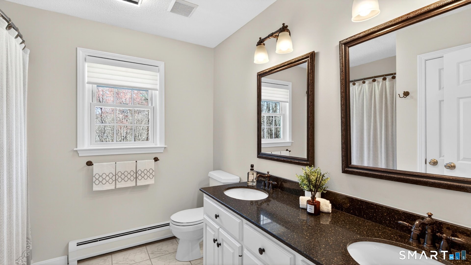 389 Huckleberry Hill Road Avon, CT 06001 - Photo 22 of 35 Ensuite full bath with tub/shower.