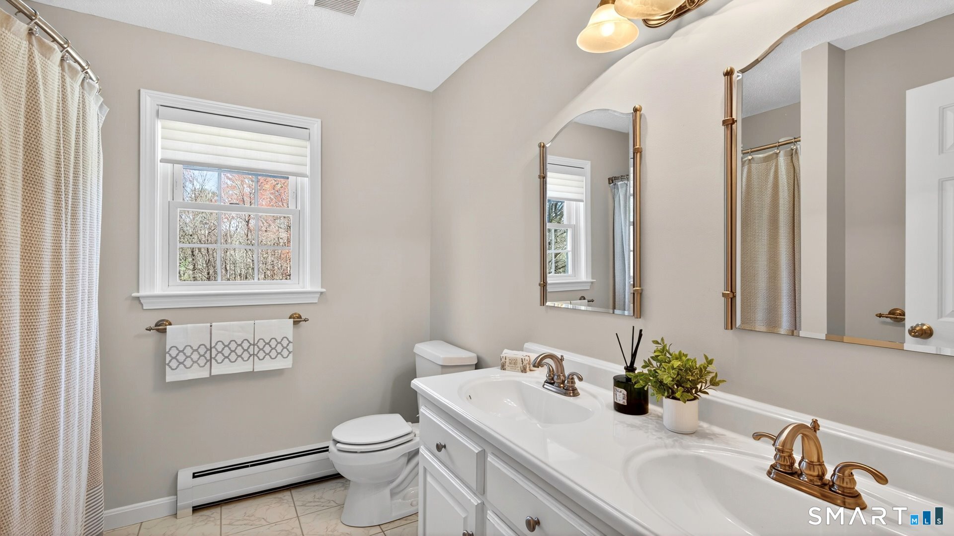 389 Huckleberry Hill Road Avon, CT 06001 - Photo 25 of 35 Hall full bath with tub/shower and double sinks.