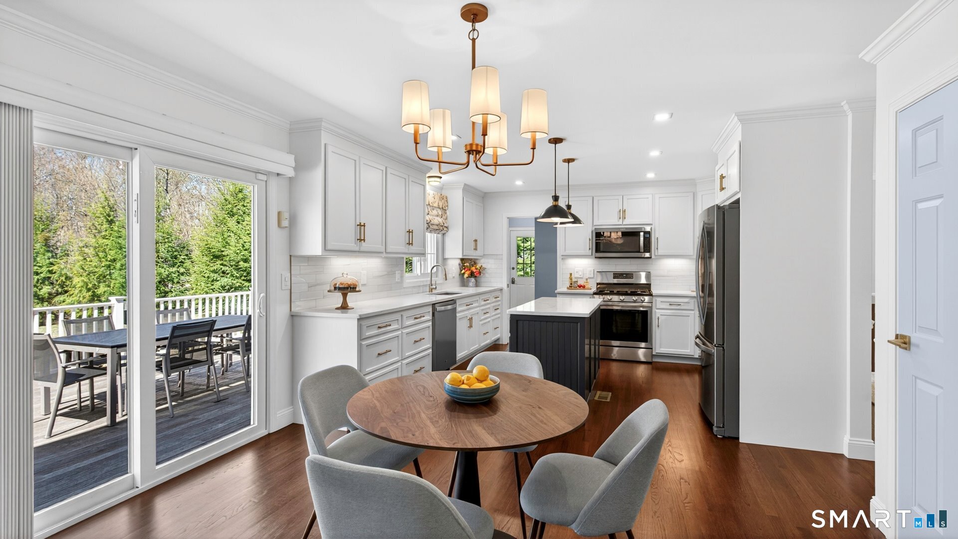 389 Huckleberry Hill Road Avon, CT 06001 - Photo 7 of 35 Spacious dining area in the kitchen with new slider that leads to the deck.