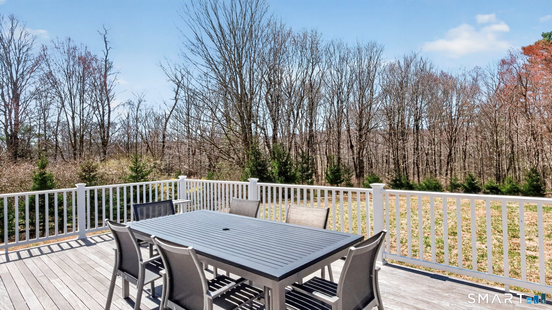 389 Huckleberry Hill Road Avon, CT 06001 - Photo 9 of 35 Expansive Ipe Deck directly off of the kitchen dining area.