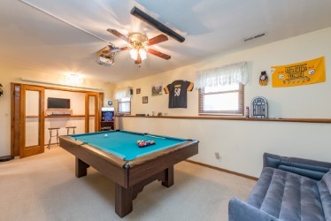 724 Roberts Road Winthrop Harbor, IL 60096 - Photo 16 of 31 a room with pool table and window