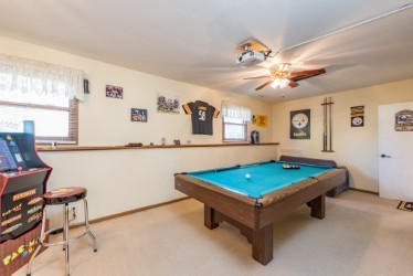 724 Roberts Road Winthrop Harbor, IL 60096 - Photo 18 of 31 a room with pool table and flat screen tv