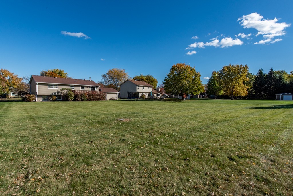 724 Roberts Road Winthrop Harbor, IL 60096 - Photo 27 of 31 a view of a house with a yard