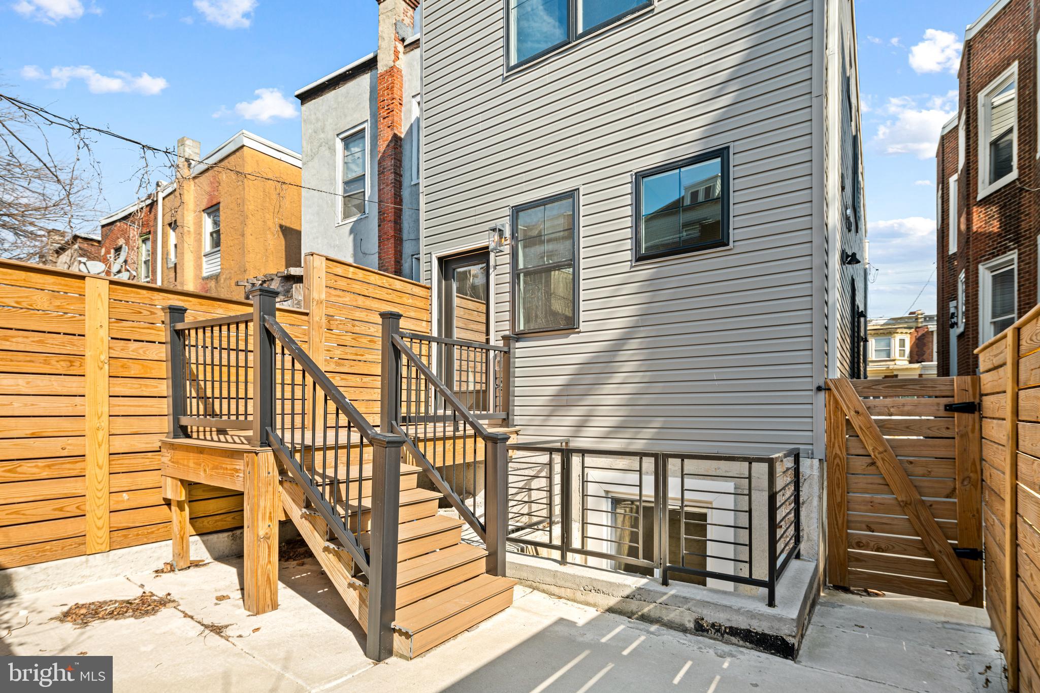 1124 Divinity Street Philadelphia, PA 19143 - Photo 12 of 37 a view of a house with a street
