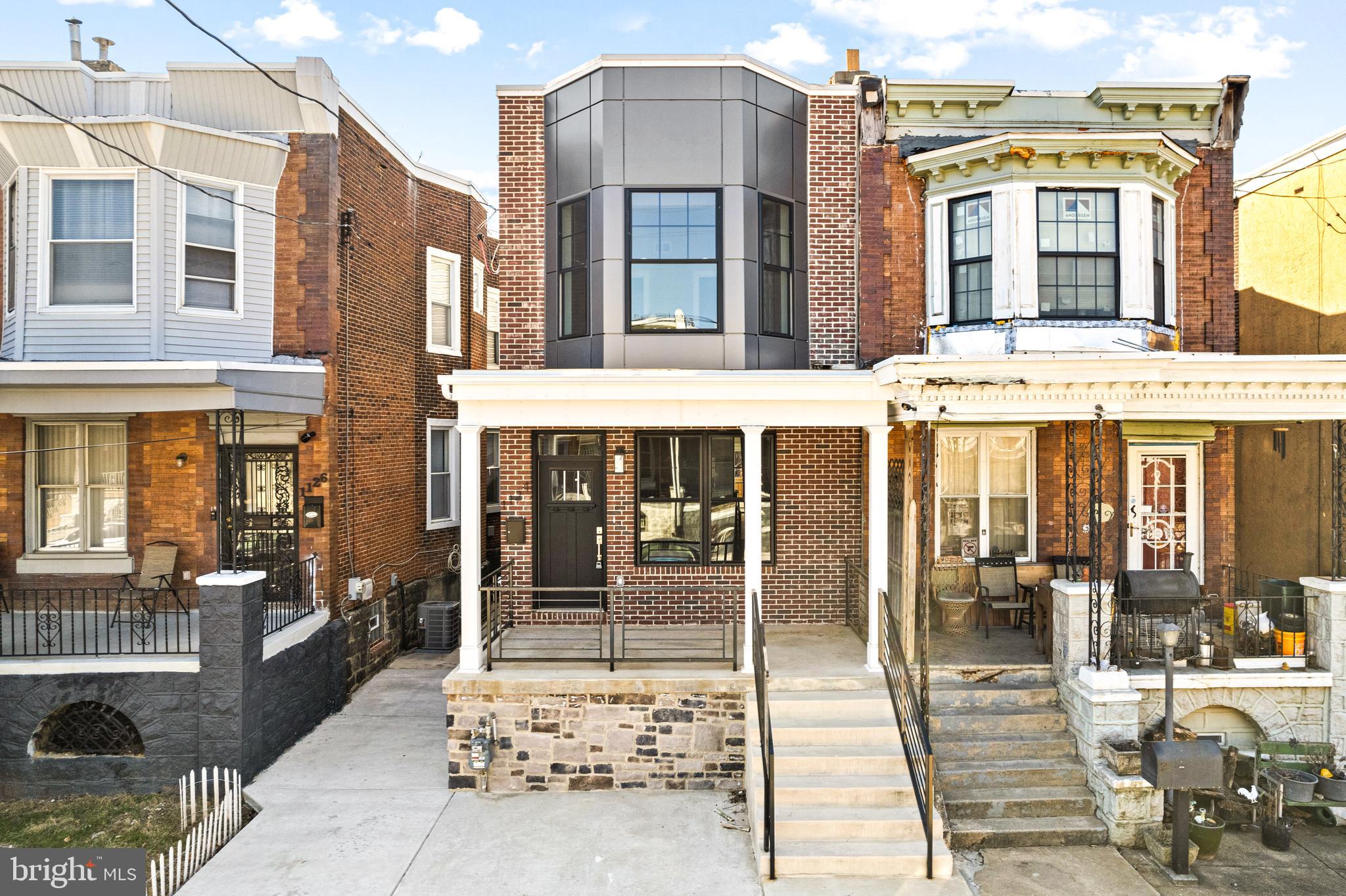 1124 Divinity Street Philadelphia, PA 19143 - Photo 35 of 37 a view of a brick building with a entrance door