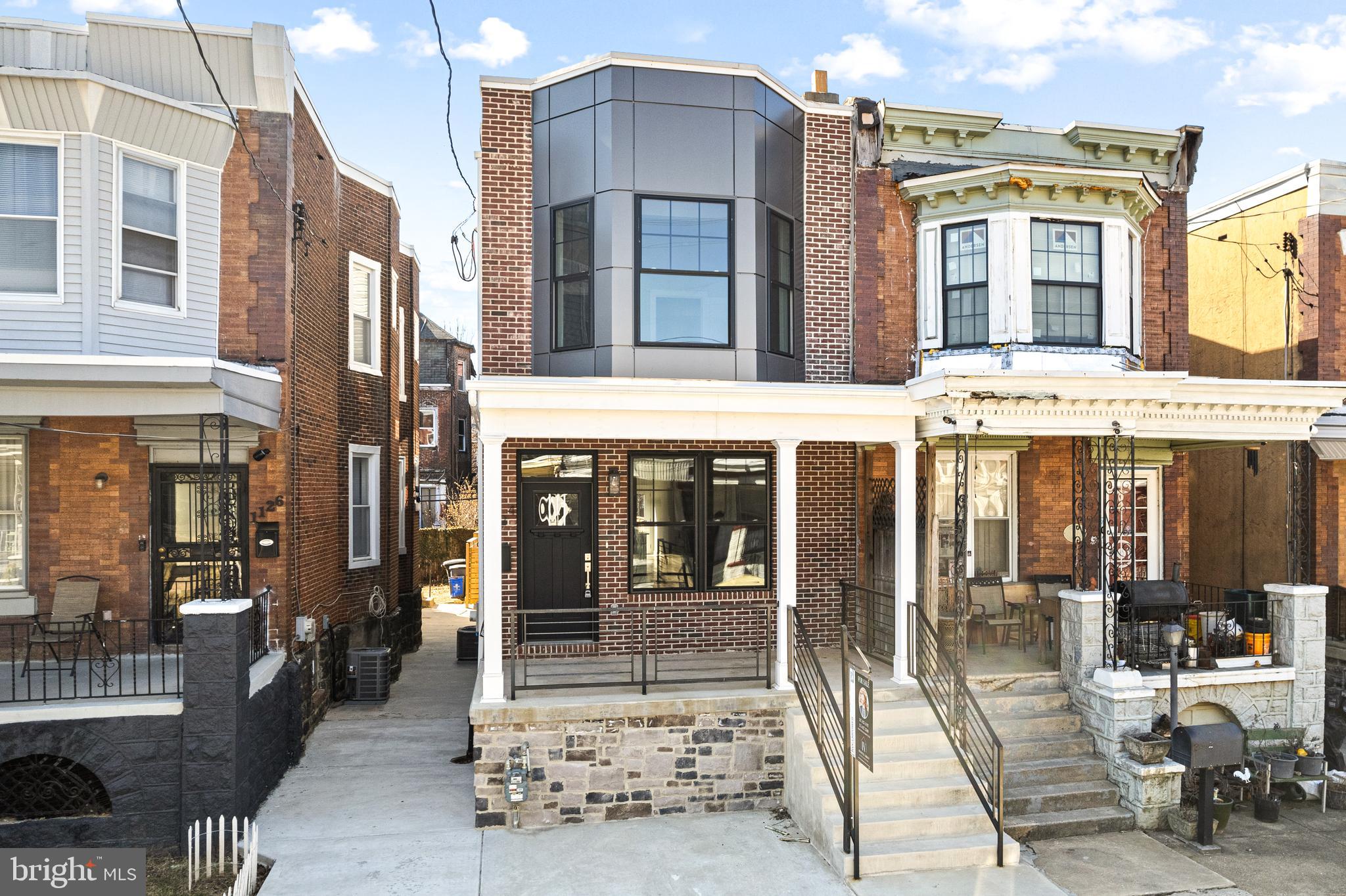 1124 Divinity Street Philadelphia, PA 19143 - Photo 36 of 37 a view of a building with a outdoor space